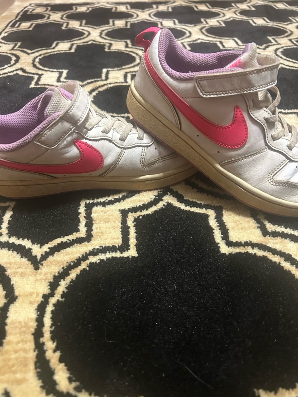 Nike Kids White Sneakers with Bright Pink Swoosh and Lavender Lining